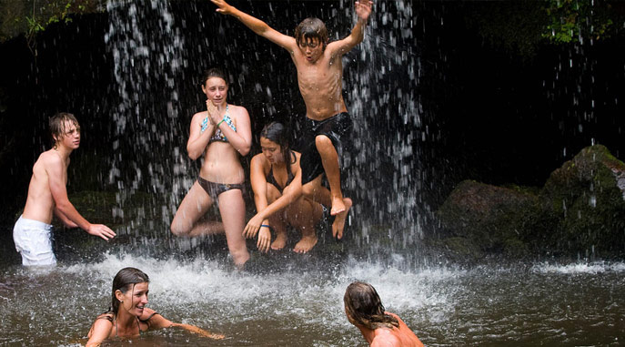 Refreshing waterfall swim after Zips